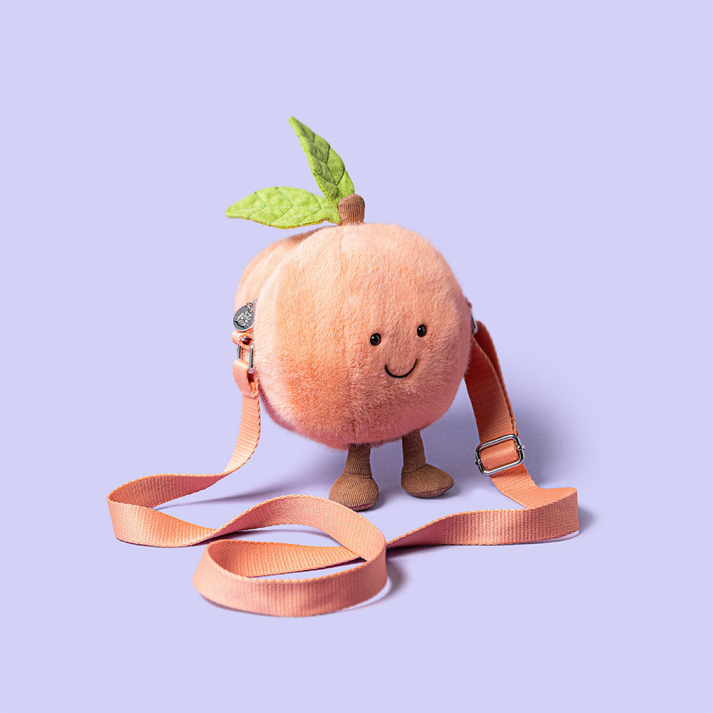 Mala de ombro Jellycat Amuseables Pêssego de lado | jellycat-mala-ombro-pessego-lollakids