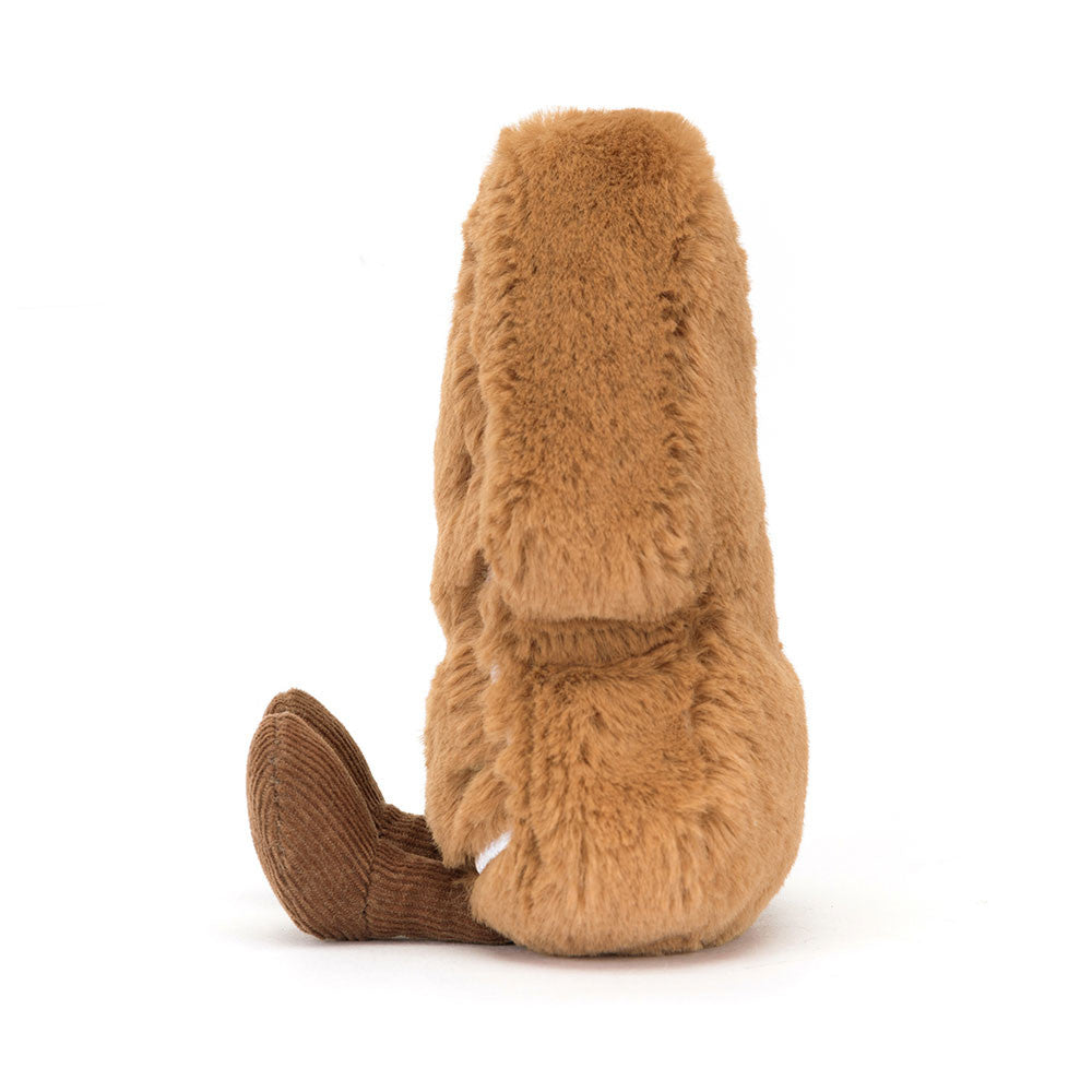 Vista lateral do Amuseables Tree Cookie da Jellycat – peluche natalício com acabamento macio e forma divertida de bolacha decorada.