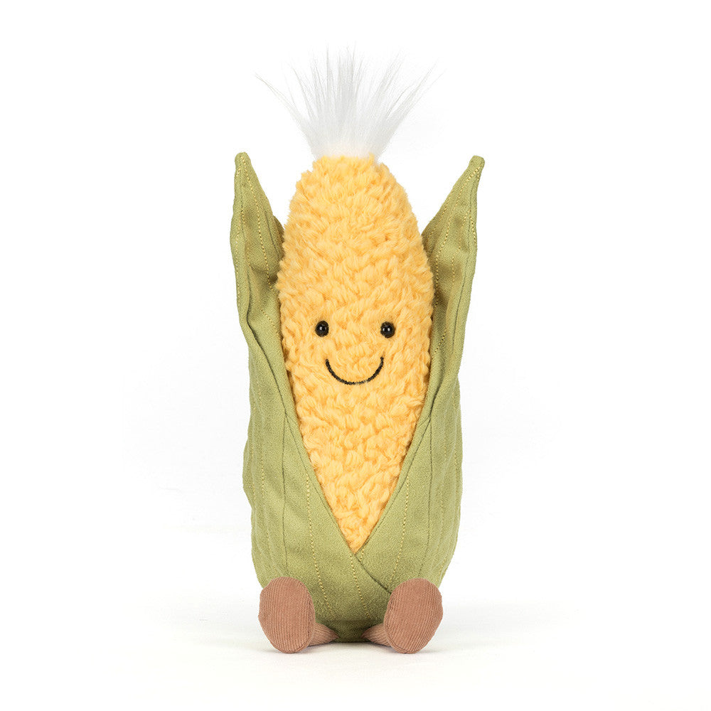 Vista frontal do Peluche Jellycat Amuseables Sweetcorn com folhas verdes e corpo amarelo