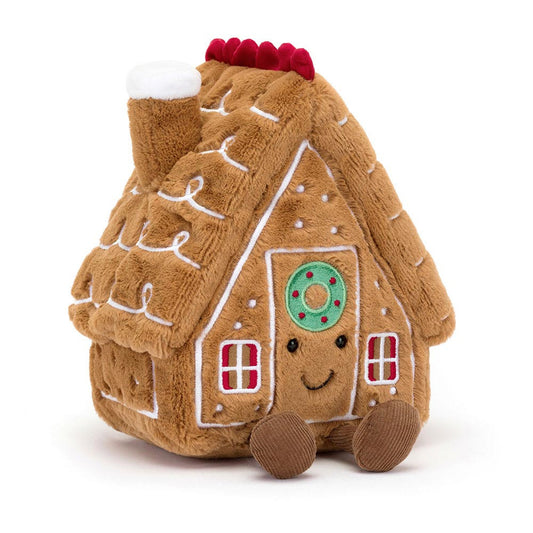 Amuseables Gingerbread House da Jellycat vista de frente – casinha de gengibre de peluche com expressão sorridente e detalhes natalícios.