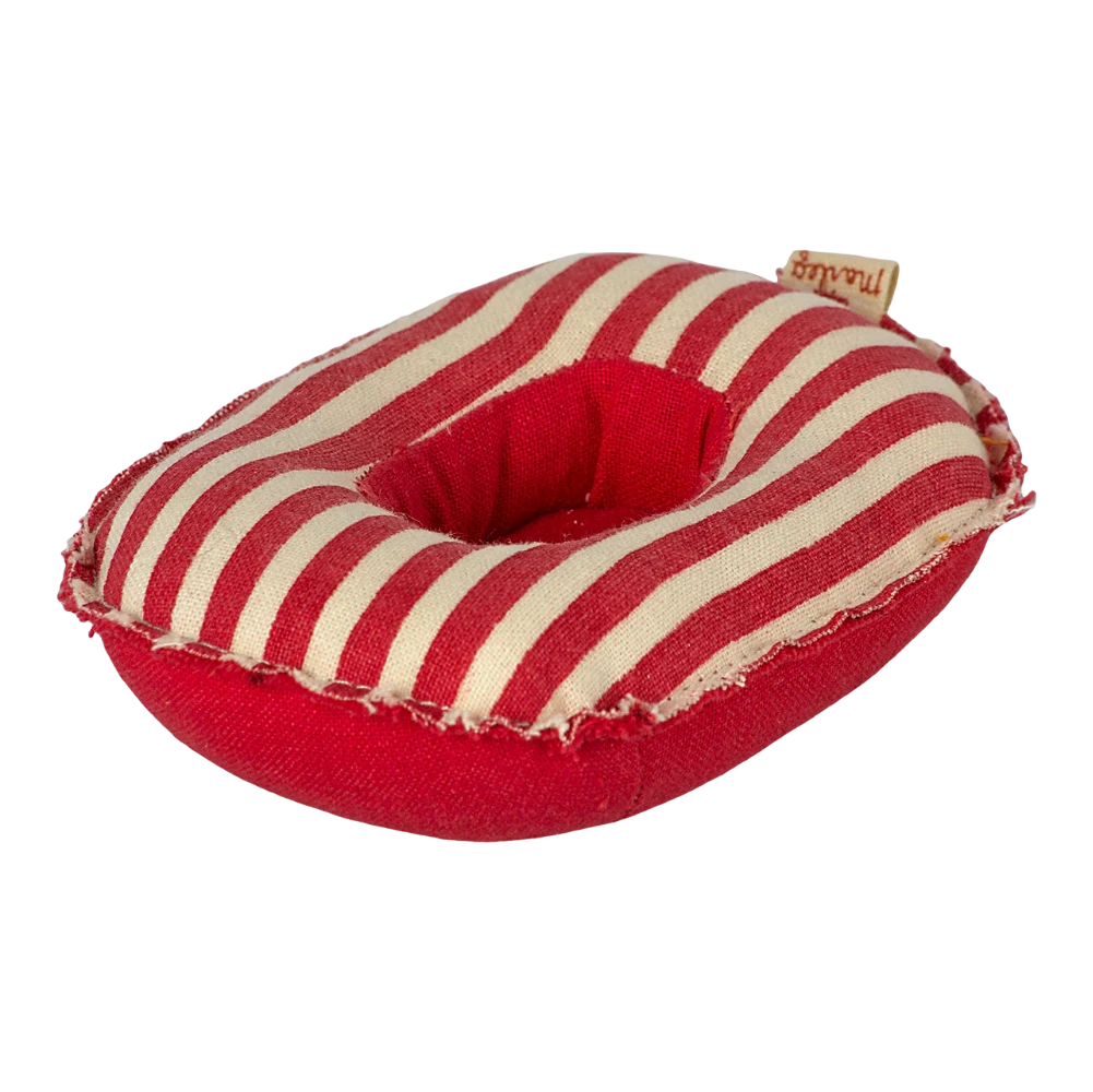 Barco insuflável em miniatura com riscas vermelhas