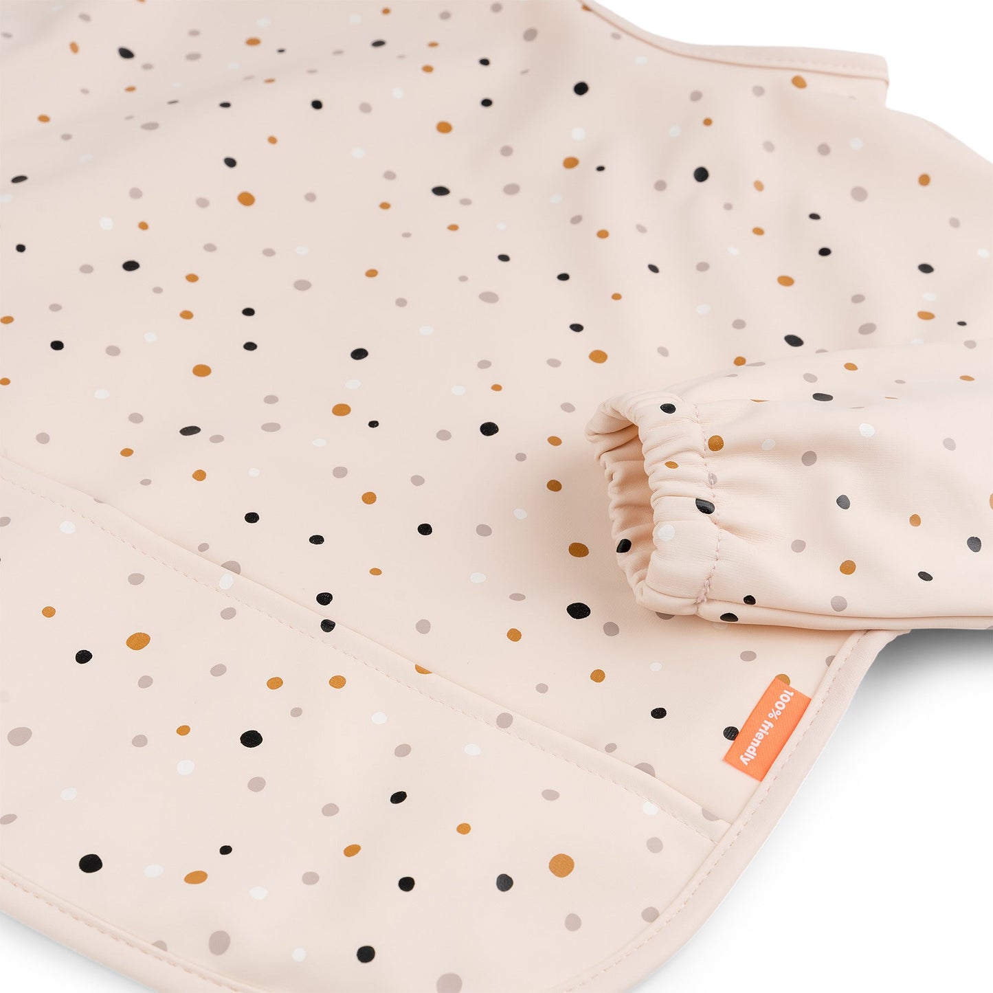 Detalhe do bolso recolhe-migalhas do babete Happy Dots Powder Done by Deer | done-by-deer-babete-mangas-happy-dots-powder-bolso-lollakids