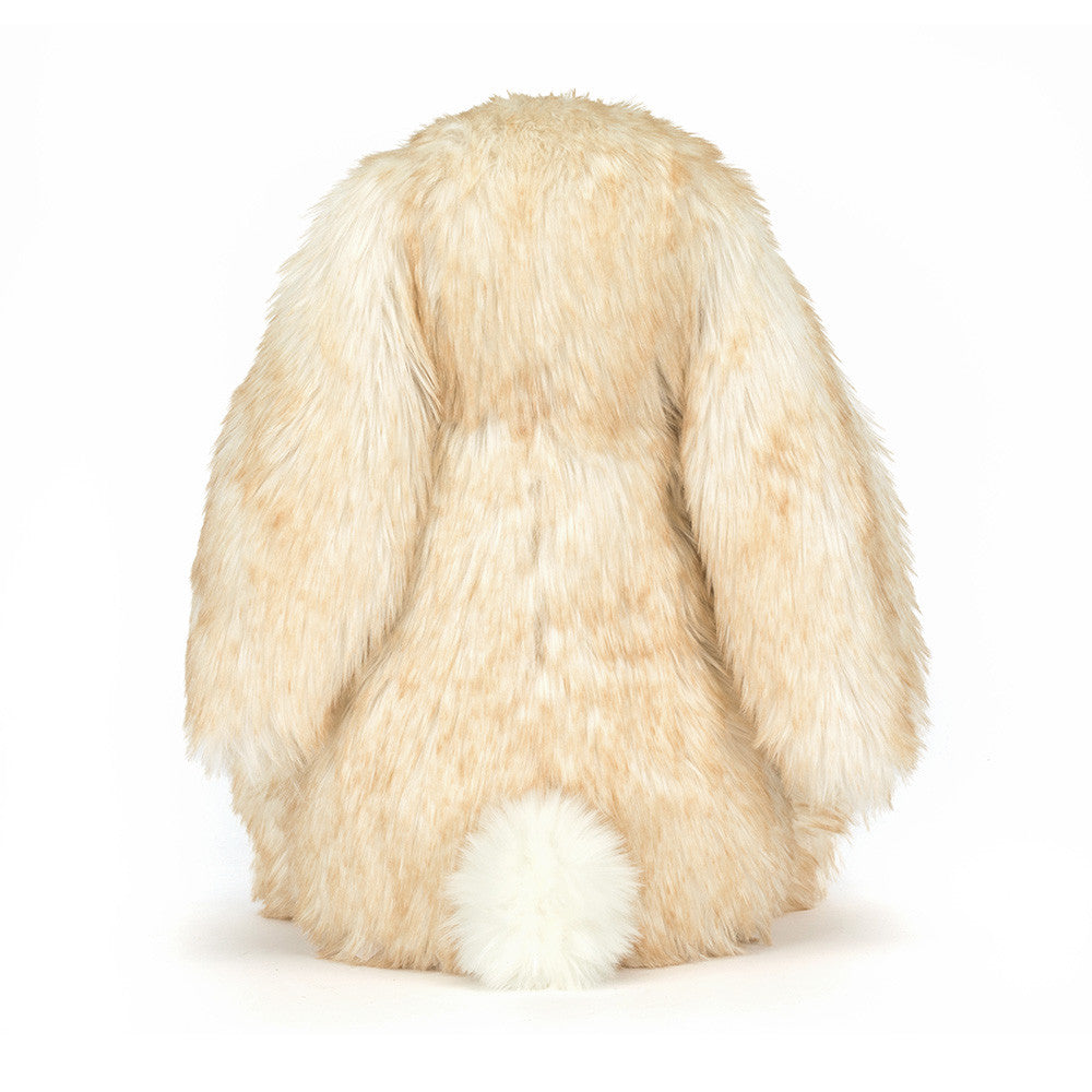 Vista traseira do Peluche Jellycat Springlowe Luxe Bunny sentado com pelo rosa