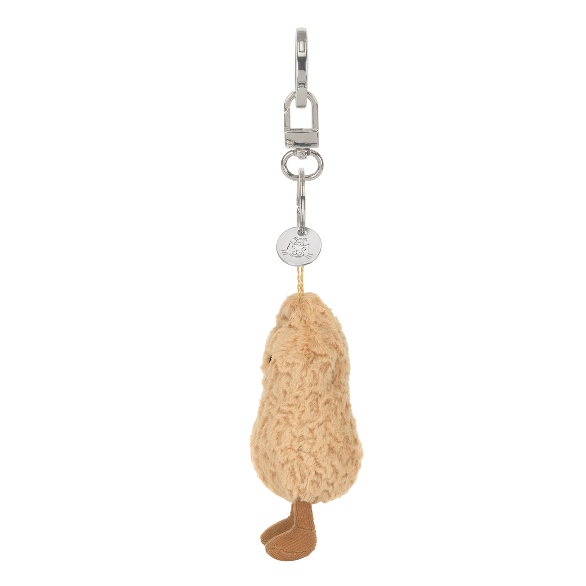 Porta-chaves Amendoim Jellycat visto de lado, com medalha Jellycat | jellycat-porta-chaves-amendoim-amuseables-lollakids