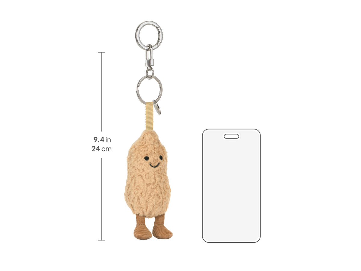 Tamanho do porta-chaves Amendoim Jellycat, 24 cm, comparado com um telemóvel | jellycat-porta-chaves-amendoim-amuseables-lollakids