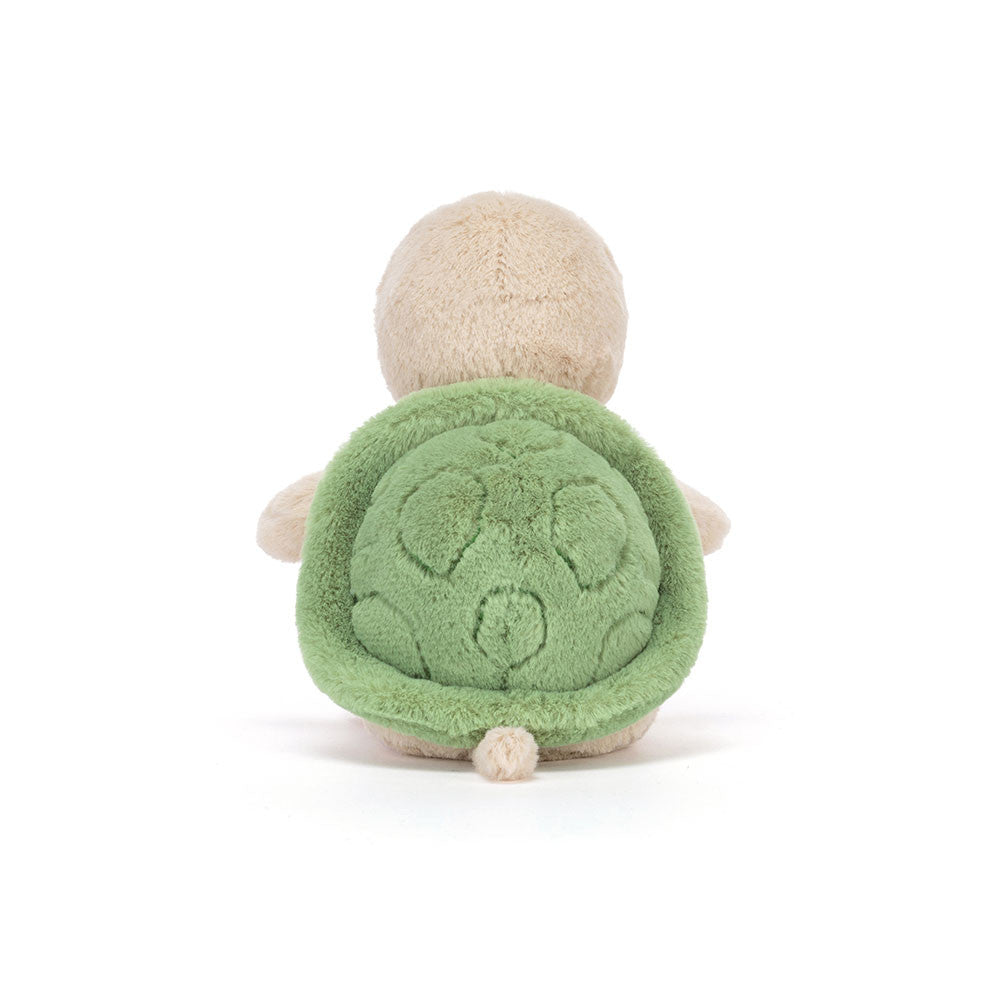 Vista lateral doPeluche Jellycat Thimble Turtle sentado com carapaça verde