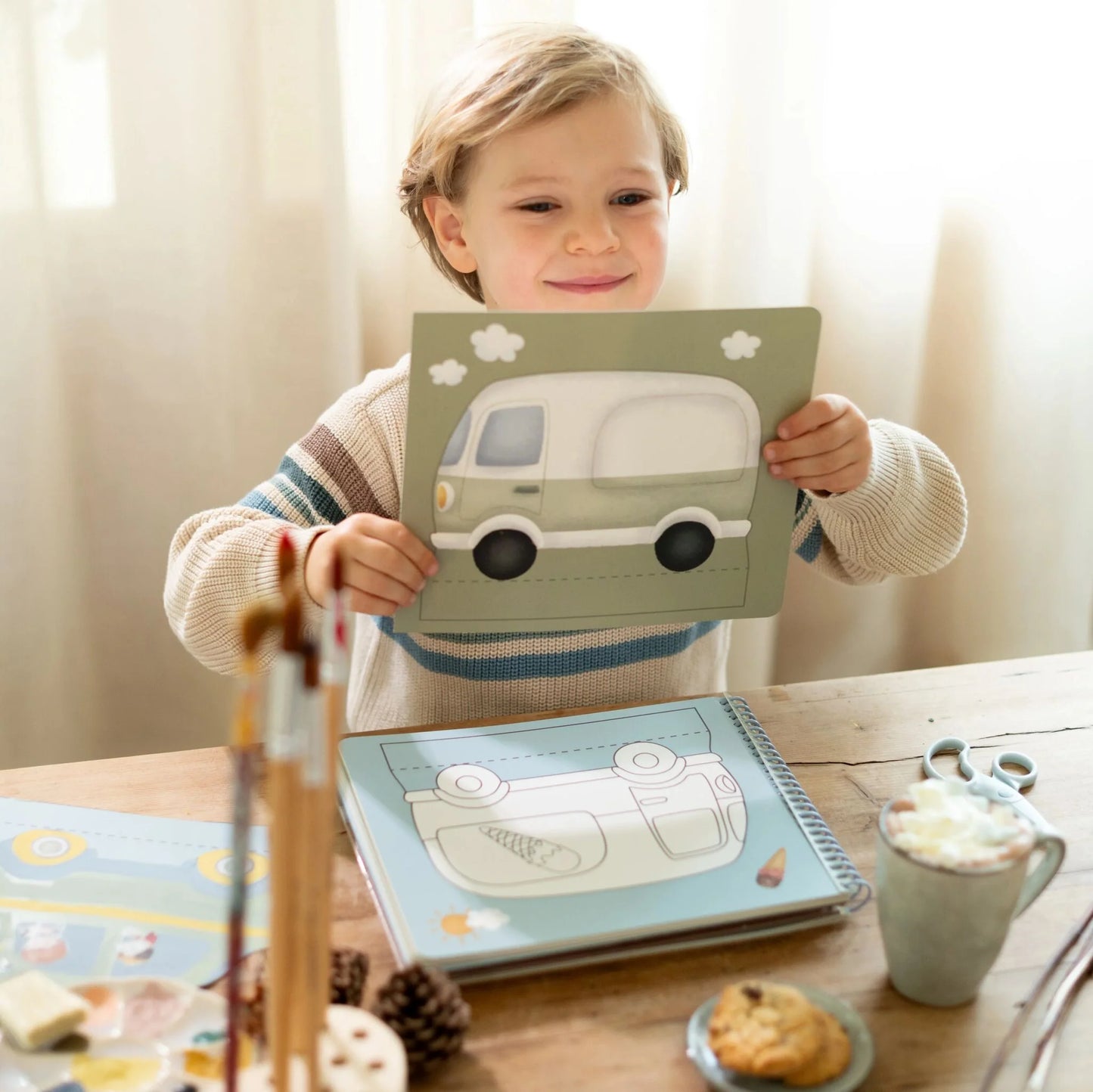 Livro de recorte com tesoura | A Garagem | Jim & Friends